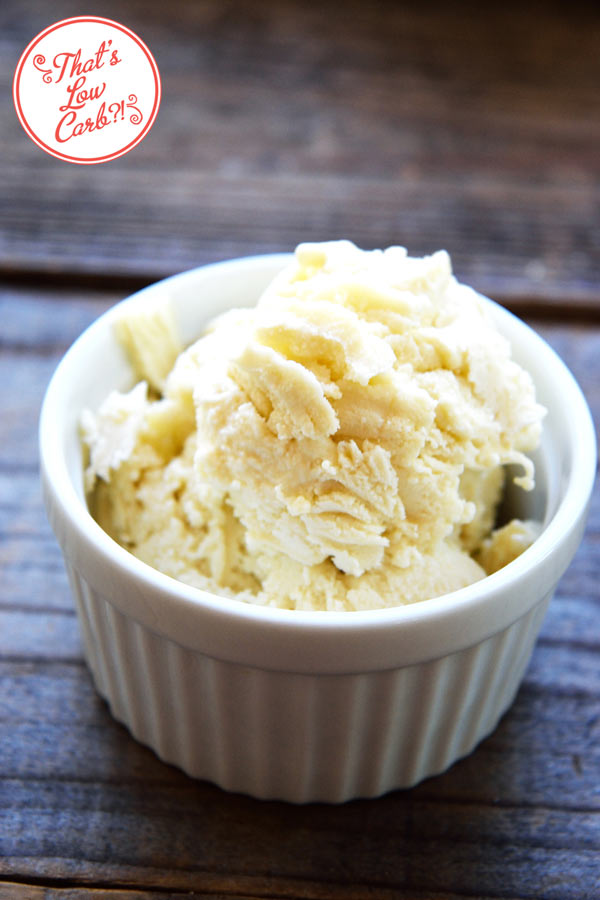 A single scoop of Low Carb Coconut Vanilla Ice Cream in a small, white bowl.