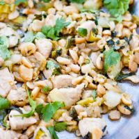 Image of Low Carb Bok Choy Chicken Stir Fry spread out on a silver tray.