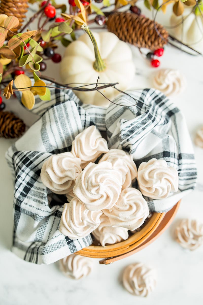 Overhead shot Pumpkin Spice Meringues stacked on top of eachother