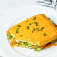 Slice of Breakfast lasagna on white plate