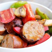 Image of Low Carb Sausage and Vegetables in a white bowl.