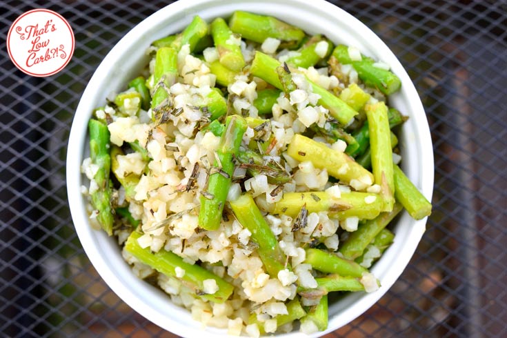 Low carb cauli-rice asparagus salad with tarragon dressing recipe shown from overhead, looking delicious and ready to eat.