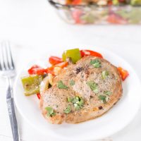 Low Carb Oven Baked Pork Chop and Peppers on a white plate.