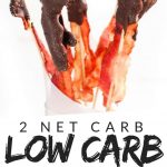 PINTEREST IMAGE with words "2 net carb Low Carb Chocolate Covered Bacon" with image of Low Carb Chocolate Covered Bacon standing straight up half covered in chocolate.