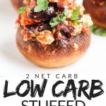 PINTEREST IMAGE with words "2 net carb low carb stuffed mushrooms" with image of Low Carb keto Stuffed Mushrooms with olives, tomato. and feta.
