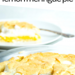 PINTEREST IMAGE with words "5 net carb keto lemon meringue pie" with the lemon meringue pie sitting in a glass pan with a slice cut out showing the inside layers of the pie. The single slice in the background on a white plate with a fork beside.