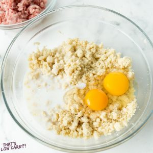 Biscuit dough being prepared in a glass bowl