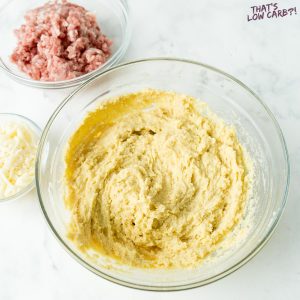 Susage and Cheese Biscuits ingredients in large glass bowls
